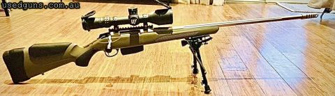scope not included. My Tikka aspire was purchased about 6 months ago from new ($1935)and comes with original receipts. Comes with Terminator muzzle brake ($300 