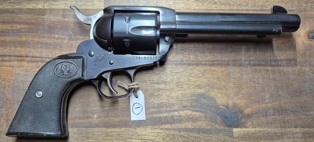 Ruger New Vaquero in good working condition. Small patches of very light pitting on hammer and barrel. $50 postage to your nominated dealer.