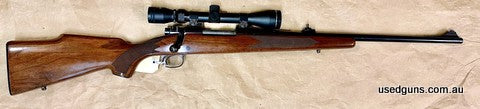 Metalwork appears to have been re-blued and the stock is from a Model 670 and has no floor plate. Tasco 3-9x40 scope and rings included. The bore is very good. 