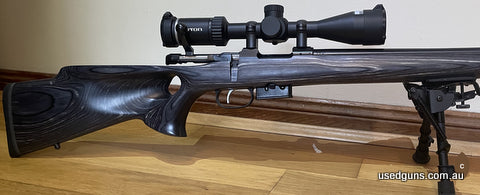 Rifle is as new only fired 12rnds, comes with Hornady custom grade dies, laminate thumbhole stock great varmint rifle