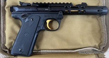 Mk IV 22/45 Lite 22LR, 10 shot 139mm barrel. Including a Volquartsen compensator fitted. 3 magazines. Picatinny rail. Adjustable sights