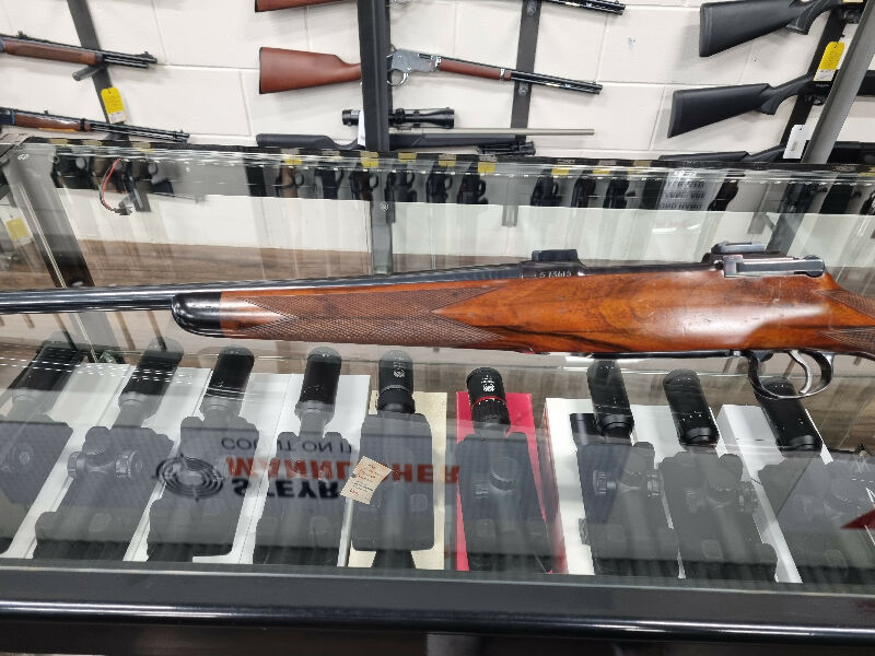 Beautifully done custom rifle built on an M17 action with an attractive walnut stock, cock on opening conversion and an excellent trigger. A lot of time and mon