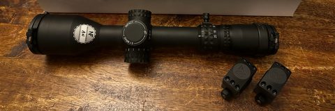Basically new Nightforce NX8 2.5-20x50, FFP, Mil-C Reticle, has sat in rings but has not been fired.., comes with low30mm 6 screw Nightforce rings and all acces