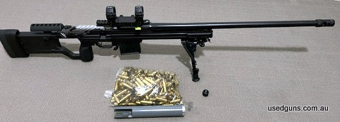 Lithgow LA105 signature model chambered in 6.5 Creedmore in a KRG whisky chassi, factory Lithgow muzzle brake and thread protector, MDT 34mm scope rings, fluted