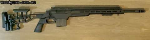 Howa 1500 .308 with a 20 inch threaded heavy Varmint barrel 1-10 twist. Sitting in a MDT ESS chassis with MDT muzzle brake, AICS style mag and picatinny rail on