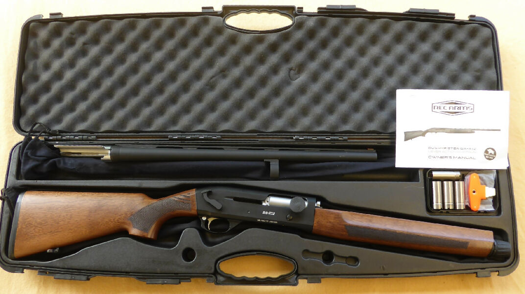Bushmeister BA-X12 Walnut stock 20" vent rib barrel, lever release shotgun in very good condition. One owner - barely used and comes with original plastic case,
