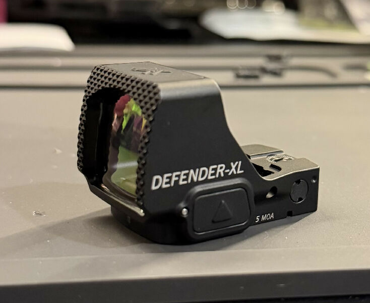 Vortex Defender XL 5moa red for sale. Glass is in perfect condition, only cosmetic wear marks on the outside of the optic. Has been used for less than 2k rounds