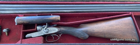 Harris Goodwin & Co. 12G SxS hammer shotgun. Chambered at 2 3/4 inch, nitro proofed. Action is tight with extractors. Wood in good condition for a gun of this e