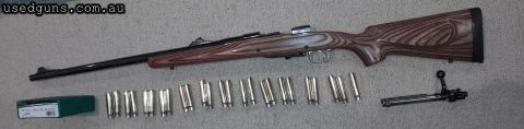 Mauser 98 action modified by Allan Swan gunsmithing and finish is first rate. Weight of rifle helps with recoil and firing a 570gn projectile with 114 gn of AR 