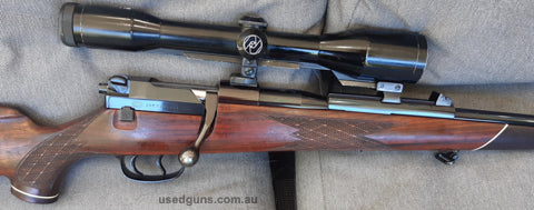 Mauser Original Oberndorf Germany 66s, double set triggers, Zeiss 6x rail scope, German #4 reticle. Comes with dies & RWS cases. Exceptional dark figured walnut