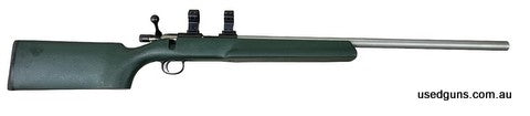 Very good condition Cooper Firearms model 57M in 22LR Benchresh single shot rifle. Features a 24 inch stainless barrel with a 1:16 twist, OD green Bell & Carlso