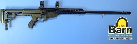 Barrett M98 338 Lapua. Fired under 100 rounds, comes with 34mm high Barrett branded rings, Pelican Hard case, has a 27 inch barrel. Comes with a muzzle brake.