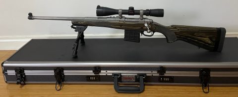 Ruger M77 Gunsite Scout with laminated stock 18" Stainless Steel barrel 18" 308Win. Includes polymer and steel 10 round mags. Redfield Revolution 3-9X40 Accuran