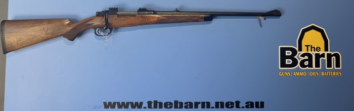 Description: Brno ZG47 7x57. Has had a set of weaver bases professionally installed by a gunsmith. Sits in a beautiful custom stock that would have been very ex
