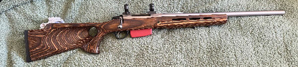 Tikka T3 Varmint stainless in 22 250 rem Boyd Thumbhole stock Leupold 30mm rings and bases 5 round magazine comes with factory stock as well ,condition is excel