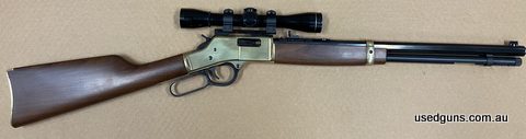 Very good condition henry big boy brass rifle chambered in 44 Mag, features an octagonal 20 inch barrel, original front and rear sights, 10 round tube magazine,