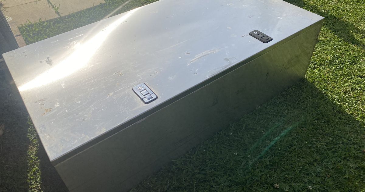 Weatherproof stainless steel gun / storage box for a ute.