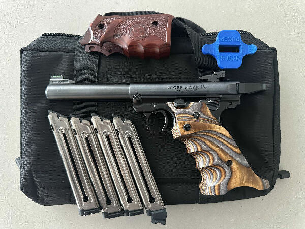 Ruger mk4 Target, a fantastic pistol with Volquartsen right hand grips, Volquartsen trigger kit, optic fibre sights and bolt loop. It comes with 4 magazines.