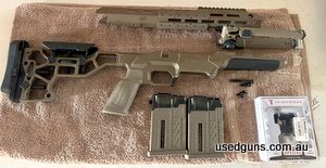 Near perfect condition MDT ESS Rem 700 SA with Magpul bipod, 2 10 round magazines, and trigger tech special straight face adjustable trigger.