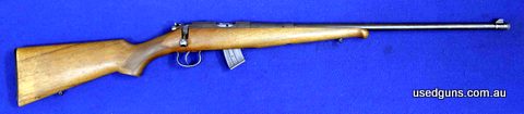 Timber stock, threaded barrel, no rear leaf sight, broken kick plate, detachable 10 shot metal magazine