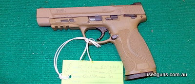 Gun comes in box with spare magazine and hand grip.