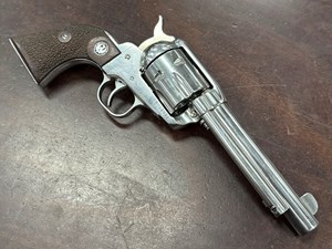 RUGER
VAQUERO
45 LONG COLT
6 SHOT
5.5 INCH BARREL
STAINLESS STEEL
CUSTOM STIPPLED TIMBER GRIPS
WITH RUGER EMBLEM
VERY SMOOTH ACTION
MANUFACTURED 1996
#56-11931

VGC+ $795