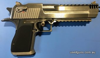Magnum Research Desert Eagle 357 Mag. Mark XIX stainless with muzzle brake. Is in very good condition, only has some minor cosmetic marks. Comes cased with 3 ma