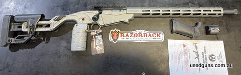 Great condition Ruger Precision in 22LR, Tactical grey cerakote. NSW compliant pinned stock, comes with two 10rd magazines and MDT vertical grip, comes with ori