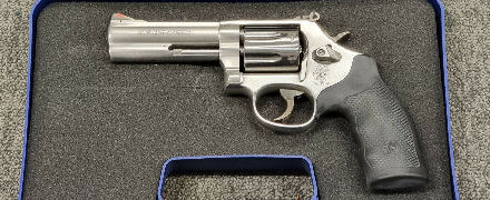 A Smith & Wesson 686 with a 4" barrel in excellent condition. The previous owner claims this gun pistol has fired less than 50 rounds. Comes with blue S&W plast