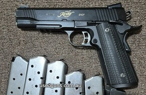 Selling my Kimber Gold Combat RL in 45 ACP because I'm downsizing to 9mm only. Serial number is K239106. Comes with 5 Ruger mags and 1 MecGar mag as pictured. A