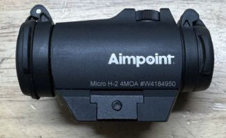 Presents as new with 4 moa red dot. Includes lens covers, pic rail base and battery, sorry no box. Was mounted briefly on a 22 Ruger mark 4 pistol which has sin