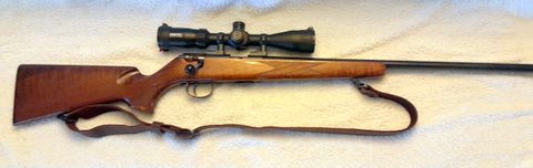 As new. Curly figure in walnut stock. Excellent accuracy.
