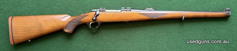 Near new tang safety 1988 Ruger RSI full stock stutzen rifle in 308. Rifle appears virtually unused. Blueing to muzzle is perfect and bolt face still retains vi