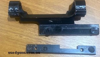Field scope mount taken off a .303-25 SMLE action rifle . Held a 4 x 40 scope.