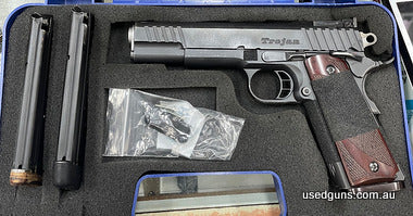 Hard to find STI 1911Trojan 9mm, comes with 2 magazines and spare grips.
