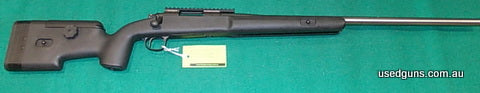 Rifle in Choate stock with LaRue 20 MOA picatinny rail and Timney flat tirgger installed.