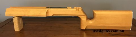 Laminated beechwood stock for round action Anschutz 54. This one has the inlet for the wing type safety and includes aluminum butt plate. Has aluminum pillars a
