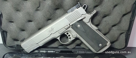 Cased with 5 magazines and spare recoil springs, Postage $65, Stock #3629