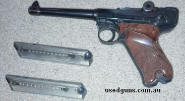 Pistol is in very good condition, comes with a spare mag and the original box which appears to be made for a 4" barrel not the current 5". While it looks like a