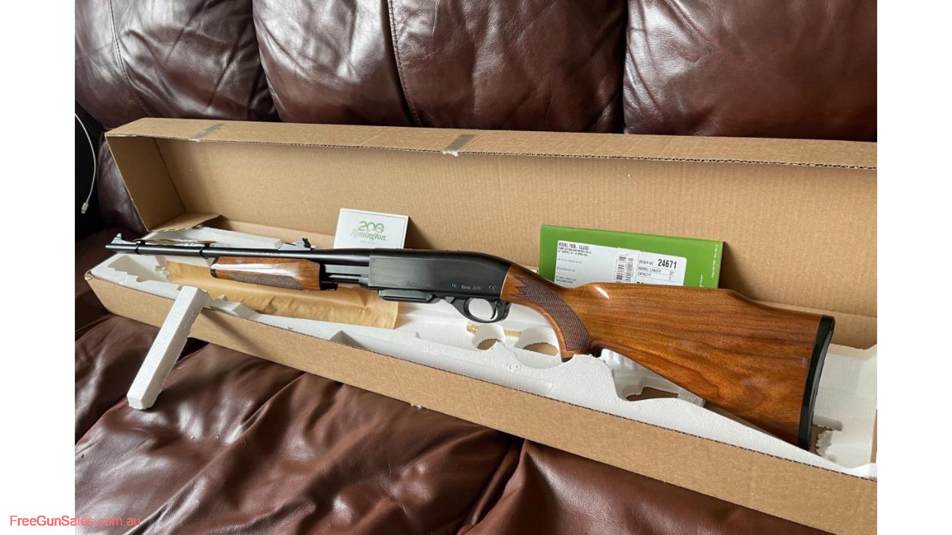 NEW IN BOX REMINGTON 7600 PUMP ACTION RIFLE 30-06 WITH WOOD STOCK BRAND NEW IN BOX