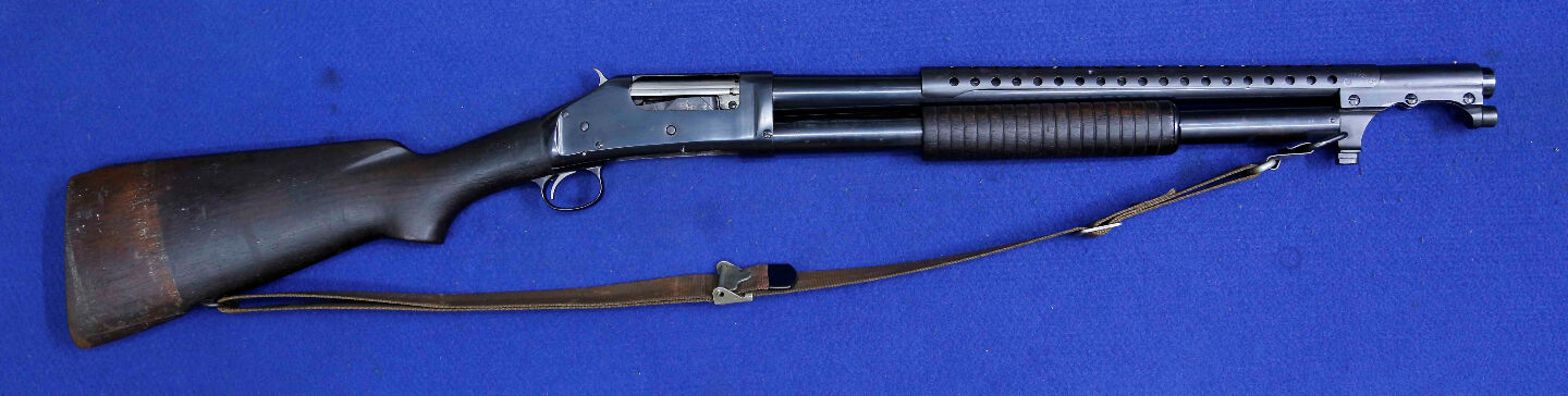 Winchester 1897, Riot or Trench gun manufacture around 1919. Condition is fair for age considering this firearm was retrieved from a rice sack in Vietnam. Firea