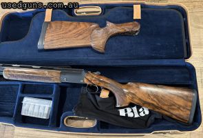 Blaser F3, 32" barrels. Currently setup for sporting w/Teague titanium thin-wall extended & ported chokes (imp cyl / mod). Includes an additional custom made gl