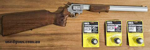 Unfired 16.5" barrel length carbine in .357 Mag/.38 Special. The rifle is complete with original case, cleaning kit and three new speed loaders. The stock has a