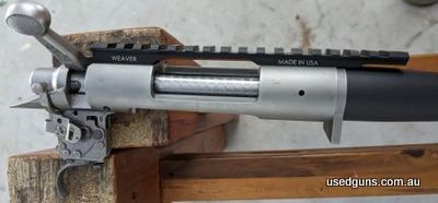 Remington 700 SPS Stainless, Weaver rail, gunsmith worked trigger, currently fitted with a varmint profile 1:10 black barrel (bought used 1000ish rounds) and co