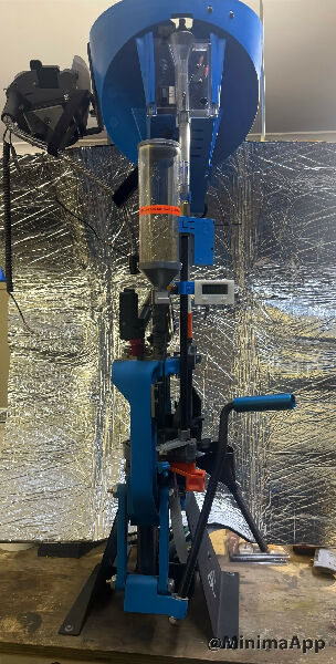 Dillon 650 Reloading press. ¬†Comes with casefeeder with small and large pistol plates, mr bullet feeder projectile feeder with plates, bench stand, roller hand