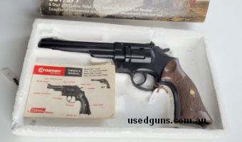 Crosman Arms Co 38 T Target CO2 double action revolver. Comes in original box with manual, no CO2 cylinders included.