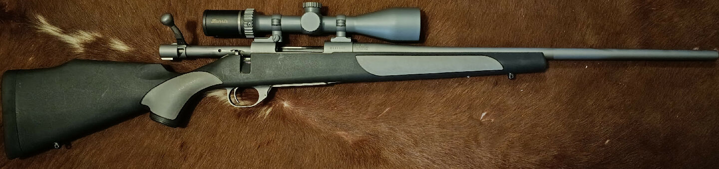 Howa 1500 in .223 with Burris FF E1 4.5-14x42 scope and Leupold Rings in Weather by Vanguard S2 stock with grey cerakoting as seen. Has hardly been used was pur