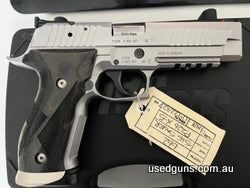 An excellent SIG P226 X-5 model in 9mm. Pistol has done little work and presents as new. Comes with SIG Case, five spare original magazines, carry case and rela