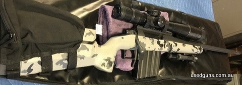 Immaculate condition, weight approximately 14 pounds, or slightly lower. It is a 375-408 CT Improved exactly the same as a .375 Snipetac it is stamped 375 Stagh