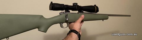Stock has marks consistent with being carried as sambar hunting rifle. Stock has also been painted light green. Scope is in good condition with some slight mark